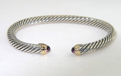 David Yurman Silver/14K Yellow Gold Amethyst Bangl: David Yurman Silver / 14K Yellow Gold Amethyst Bangle The total Bangle's weight is 25.4 grams. The size of Amethyst: 2 x 2 mm. The measurement of the inside bangle is 50 x 41 mm, Thickness: 4 mm.