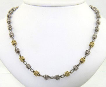 Judith Ripka Silver & 18K Yellow Gold Necklace: Judith Ripka Silver & 18K Yellow Gold Necklace The total weight of Necklace is 23.2 grams The necklace is 4 mm wide The Necklace is 17.5" long