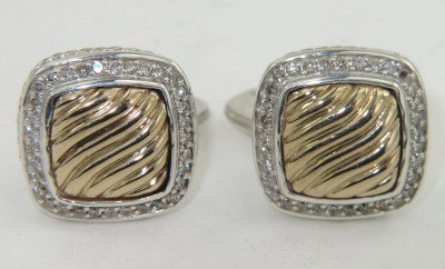 David Yurman Silver/ 18K Gold Diamond Cufflinks: David Yurman Silver/18K Yellow Gold Diamond Cufflinks The total weight of cufflinks is 18.3 grams. Total Diamond weight: 0.66 cts, approximately. I color, SI clarity The size of cufflinks on the surfa