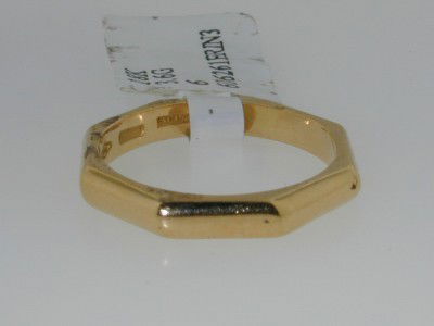 Bvlgari 18K Yellow Gold Ring: This is an Authentic Bvlgari 18K Yellow Gold Ring The total ring's weight is 3.6 grams. The measurement on the sureface of the ring's face is 3mm wide The size of the ring is 6