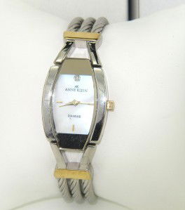 Anne Klein Stainless Steel Watch: Anne Klein Stainless Steel Watch The total watch's weight is 37.3 grams The measurements of the watch head is 27 x 19 mm and 5 mm in thick. The length of watch: 6" Water Resistant Chain is 9 mm wide