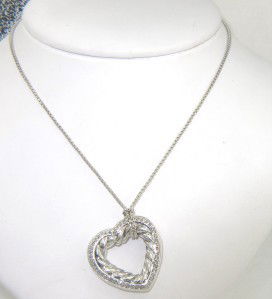 David Yurman Silver Diamond Necklace: David Yurman Silver Diamond Necklace. The total necklace's weight is 14.8 grams. The total weight of diamonds is 0.5 cts. approximately I and SI clarity. The size of the Pendant is 25 x 25 mm, Thickne