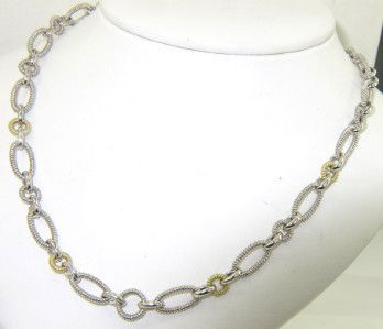 Judith Ripka Silver & 18K Yellow Gold Necklace: Judith Ripka Silver & 18K Yellow Gold Necklace. The total weight of Necklace is 27.5 grams. The necklace is 6 mm wide. The Necklace is 17.5" long