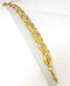Gurhan 24K Yellow Gold Diamond Bracelet: Gurhan 24K Yellow Gold Diamond Bracelet The total weight of bracelet is 27.9 grams. The toal weight of diamond: 0.85 cts. approximately, G color VS clarity. There are 81 round diamonds on bracelet. Th