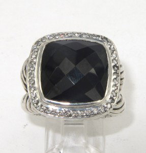 David Yurman Silver/18K Gold Onyx & Diamond Ring: David Yurman Silver/18K Gold Onyx & Diamond Ring The total ring's weight is 15.4 grams. The total weight of the diamond is 0.43 cts approximately, I color SI clarity. The size of the onyx is 12 x 12 m