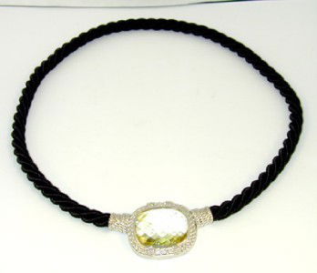 Judith Ripka Citrine & CZ Necklace: Judith Ripka Citrine & CZ Necklace The weight of necklace is 33.1 grams The total weight of Diamonique (CZ'S): 0.35 cts The measurements of citrine: 26 x 20 mm The size of the pendant is 32 x 27 mm Th