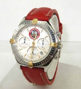 Breitling Stainless Steel Chronograph Watch: Breitling Stainless Steel Two-Toned Chronograph Leather Strap Watch. The total watch's weight is 56.8 grams. The measurements of watch head is 32 x 32 mm and 9 mm thick. The length of watch: 9". Case