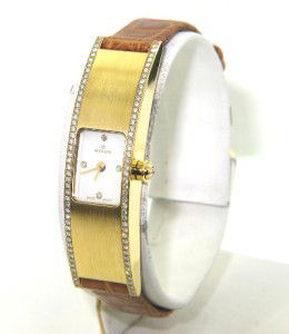 Milus 18K Yellow Gold Diamond Leather Strap Watch: Brand New Milus 18K Yellow Gold Diamond Leather Strap Watch With Box.The total watch's weight is 33.9 grams.The total weight of diamond: 1 cts. G color VVS clarity.The measurements of the watch head i