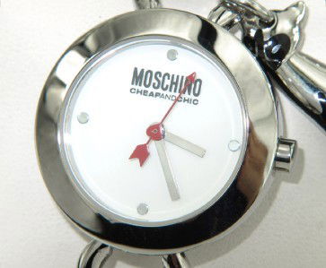 Moschino Stainless Steel Watch: Brand New Moschino Stainless Steel Watch The total watch's weight is 110.7 grams. The size of each watch head: 28 x 28 mm and 8 mm thick The length of the watch is 8" Japan Movement Water Resistant Ch