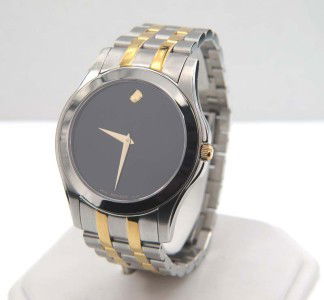Movado Stainless Steel & Gold Plated Watch: Movado Stainless Steel & Gold Plated Watch The total watch's weight is 116.5 grams. The measurements of the watch head is 30 x 39 mm and 5 mm thick The length of watch: 8.25" Swiss Made Water R