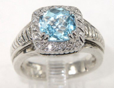 Charles Krypell 14K Gold/Silver Blue Topaz Diamon: Charles Krypell 14K Gold/Silver Blue Topaz and Diamond Ring The total ring's weight is 7.7 grams. The total weight of diamond 0.12 cts.,approximately. H color VS clarity. The size of the blue topaz is