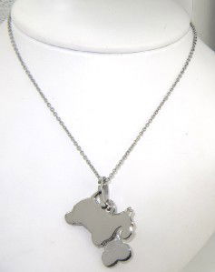 Moschino Silver Necklace: Moschino Silver Necklace The total necklace weight is 10.8 grams. The measurement of pendant: 24 x 11 mm and 1 mm thick. The length of necklace is 23".