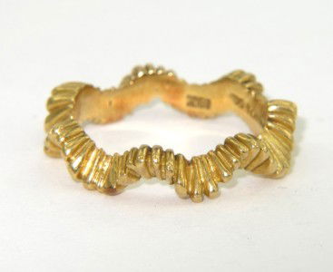 Tiffany & Co 18K Yellow Gold Ring: Tiffany & Co 18K Yellow Gold Ring.The total ring's weight is 4.8 grams.The ring is 2 mm in thickness.The size of the ring is 6.