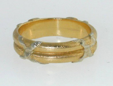 Buccellati 18K Yellow Gold Ring: Buccellati 18K Yellow Gold Ring. The total ring's weight is 6.7 grams. The ring is 4 mm wide and 1 mm in thickness. The size of the ring is 7.25.