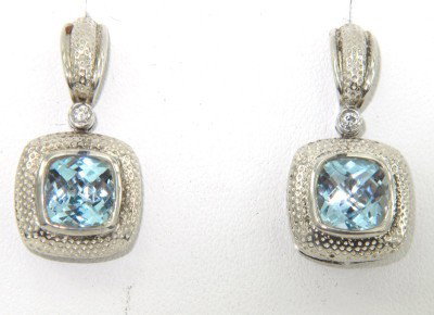Charles Krypell Gold/Silver Blue Topaz Diamond Ea: Charles Krypell 14K White Gold/Silver Blue Topaz Diamond Earrings with Original Pouch. The weight of the Earring is 8.6 grams. The size of Blue Topaz is 8 x 8 mm . The total weight of diamond is 0.06
