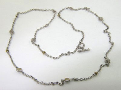 Judith Ripka Silver/18K Gold Diamond Necklace: Judith Ripka Silver/18K Yellow Gold Diamond Necklace Necklace's Weight : 24.6 grams. The total weight of diamond: 0.12 cts. G color VS clarity The length of necklace is 58" long