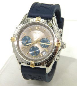Breitling Stainless Steel Chronograph Watch: Breitling Stainless Steel Two-Toned Chronograph Rubber Strap Watch The total watch's weight is 85.9 grams. The measurements of watch head is 33 x 33 mm and 11 mm thick. The length of watch: 9.5". Case