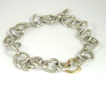 David Yurman Silver Bracelet: David Yurman Silver Bracelet The total weight of bracelet is 16 grams. The length of the bracelet is 7.25" inches long.