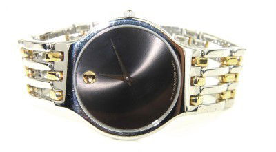 Movado 2-Tone Stainless Steel Quartz Watch: Movado 2-Tone Stainless Steel Quartz Watch The total watch's weight is 59.5 grams. The measurements of the watch head: 27 x 27 mm and 4 mm thick. The length of watch: 6.75". Swiss Made. Water Re