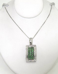 14K White Gold Diamond & Tsavorite Necklace: 14K White Gold Diamond & Tsavorite Necklace. The total weight of Necklace is 3.5 grams. The total weight of diamond is 0.25 cts. approximately, I color SI clarity. The total weight of tsavorite: 0.42