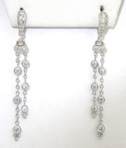 Judith Ripka 18K White Gold Diamond Earrings: Judith Ripka 18K White Gold Diamond Earrings With Pouch. The total earring's weight is 4.8 grams. The total weight of diamond: 0.92 cts., approximately. H color VS clarity. There are 28 round diamonds