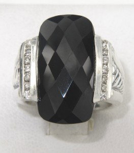 David Yurman Silver Diamond & Onyx Ring: David Yurman Silver Diamond & Onyx Ring. The total ring's weight is 12.7 grams. The total diamonds weight are approximately 10 pts, H-I color and VS1 clarity. The measurement of onyx: 20 x 10 mm and 5