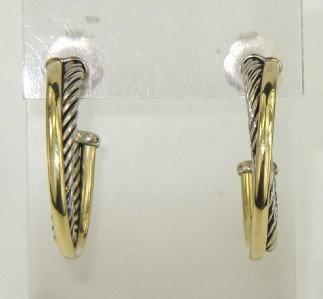 David Yurman Silver/18K Yellow Gold Earrings: David Yurman Silver/18K Yellow Gold Earrings. The total earrings weight is 9.7 grams. The measurements of earring: 27 x 20 mm. The earring is 4 mm in wide and 2 mm in thickness.