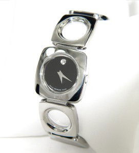 Movado Stainless Steel Watch: Movado Stainless Steel Watch The total watch's weight is 50 grams. The measurements of the watch head is 23 x 23 mm and 4 mm thick. The length of watch: 6.25". Swiss Made. Water Resistant. Ch