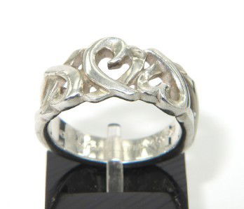 Tiffany & Co. Silver Ring: Tiffany & Co. Silver Ring Ring's Weight: 4.8 grams. The Ring's size is 5.25. The measeurements on the surface of ring is 10 mm wide and 3 mm thick.