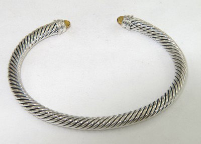 David Yurman Silver Citrine & Diamond Bangle: David Yurman Silver Citrine & Diamond Bangle Bangle's Weight: 25.5 grams. The weight of diamond: 0.09 pts, I color, VS - SI clarity. The size of citrine: 3 x 3 mm. The measurements of the Inside Bangl