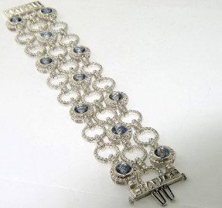 Charles Krypell Gold/Silver Blue Quartz Bracelet: Charles Krypell 14K Gold/Silve Blue Quartz Bracelet Weight of Bracelet: 75.8 grams The measurement of blue quartz: 5 x 5 mm The length of Bracelet: 7" The bracelet is 30 mm wide and 5 mm in thickness