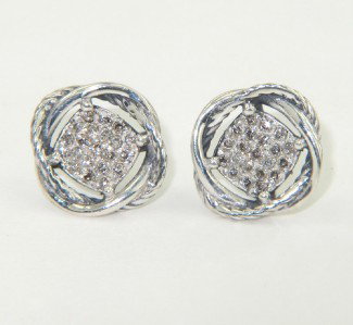 David Yurman Silver Diamond Earrings: David Yurman Silver Diamond Earrings The total earring's weight is 2.2 grams. The total weight of diamond: 0.36 cts., approximately. I color SI clarity. The size of the earring: 10 x 10 mm and 1 mm in