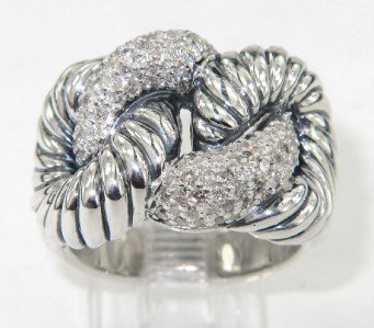 David Yurman Silver Diamond Ring: David Yurman Silver Diamond Ring The total ring's weight is 13.3 grams. The total weight of diamond is 0.93 cts. approximately , H - I color VS - SI clarity. The size of the ring's surface is 14 x 22 