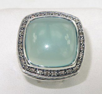 David Yurman Silver Chalcedony & Diamond Ring: David Yurman Silver Chalcedony & Diamond Ring The total ring's weight is 20.8 grams. The total weight of the diamond is 0.49 cts approximately, H color VS clarity. The size of the chalcedony is 15 x 1
