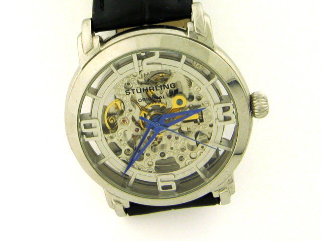 Stuhrling Original Men's Lifestyle 'Winchester' S: This is a Stuhrling 165 Winchester Auto Skeleton Mechanical Mens Watch with the following features: 316L surgical grade stainless steel; Leather Padded Strap (22mm) with water repellant lining; Self-W