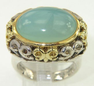 Charles Krypell Gold/Silver Chalcedony Ring: Charles Krypell 18K Gold/Silver Chalcedony Ring The total ring's weight is 15.3 grams. The size of the Chalacedony is 16 x 11 mm. The measurement of ring's surface is 23 x 17 mm and 11 mm thick. The s