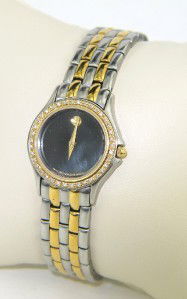 Movado 2-Tone Stainless Steel Diamond Quartz Watch: Movado 2-Tone Stainless Steel Diamond Quartz Watch The total watch's weight is 45.7 grams. The total weight of diamond: 0.4 cts., approximately. I color SI clarity. The measurements of the watch head: