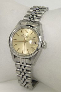 Rolex Stainless Steel DateJust Ladies Watch: van Cleef & Arpels Stainless Steel Leather Strap Watch. Watch's Weight: 85.6 grams. The measurements of watch head: 40 x 40 mm and 12 mm in thickness. The length of watch: 8.5". Strap is 17 mm wide. S