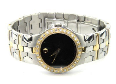 Movado 2-Tone Stainless Steel Diamond Watch.: Movado 2-Tone Stainless Steel Diamond Watch The total watch's weight is 69.4 grams. The total weight of diamond: 0.6 cts. I color SI clarity The measurements of the watch head is 20 x 25 mm and 5 mm t