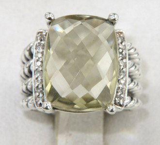 David Yurman Silver Lemon Citrine & Diamond Ring: David Yurman Silver Lemon Citrine & Diamond Ring The total ring's weight is 10.3 grams. The total diamond weight is 0.32 cts ,approxmiately. I color SI clarity. The size of lemon citrine is 15 x 11 mm