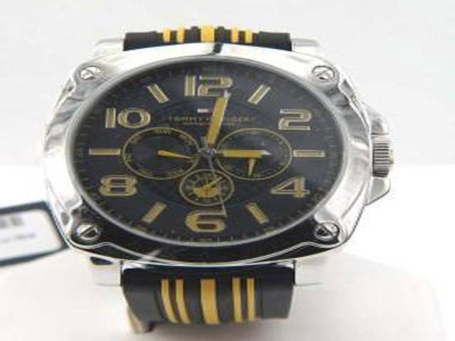 Tommy Hilfiger Men Sport Stainless Steel with Alum: This is a Tommy Hilfiger Stainless Steel Watch with Aluminum Bezel and Black Round Dial, Arabic Dark Yellow Numerals with Dial Markers. The Strap is a Nylon Dark Yellow with Black leather trim. Case D