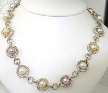 Charles Krypell Silver Pearl Necklace: Charles Krypell Silve Pearl Necklace Weight of necklace: 62 grams. The measurement of pearl: 6 x 6 mm. The length of necklace: 17.5". The necklace is 12 mm wide and 3 mm in thickness.