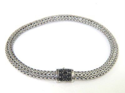 John Hardy Silver Onyx Bracelet: John Hardy Silver Onyx Bracelet. The total Bracelet's weight is 16.8 grams. The total weight of onyx: 0.24 cts., approximately. The bracelet is 3 mm wide and 2 mm in thickness. The length of bracelet: