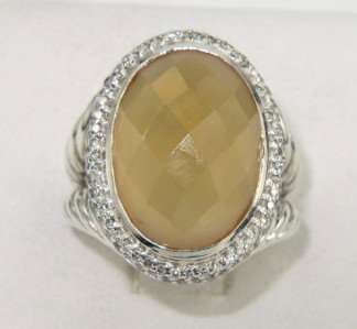 David Yurman Silver Citrine & Diamond Ring: David Yurman Silver Citrine & Diamond Ring. The total ring's weight is 11.3 grams. The total diamond weight is 0.91 cts ,approxmiately. H color VS clarity. The size of citrine is 17 x 12 mm. The size 