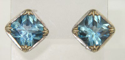 John Hardy 18K Yellow Gold /Silver Blue Topaz Earrings: John Hardy 18K Yellow Gold /Silver Blue Topaz Earrings. The total Earrings' weight is 12.6 grams. The measurement of blue topaz: 10 x 10 mm. The size of the earring is 13 x 13 mm, 7 mm thickness.