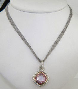 Charles Krypell Silver/14K Gold Pink Topaz Necklac: Charles Krypell Silver/14K Gold Pink Topaz Neckalce The weight of the Necklace is 12 grams. The size of pink topaz is 12 x 12 mm. The necklace is 16.5" long. The measurements of pendant: 31 x 19 mm an