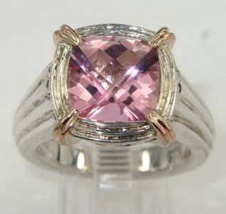 Charles Krypell Silver/14K Gold Pink Topaz Ring: Charles Krypell Silver /14K Gold Pink Topaz Ring The total ring's weight is 11.7 grams. The size of the pink topaz is 9 x 9 mm. The size of the ring is 7.25. The measurement of the face of the ring is