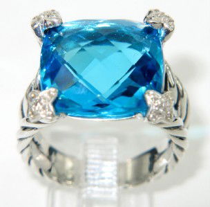 David Yurman Silver, Blue Topaz & Diamond Ring: David Yurman Silver, Blue Topaz & Diamond Ring The total ring's weight is 8.5 grams The total weight of the diamond is 0.25 cts approximately, H - I color VS - SI clarity The size of the blue topaz is