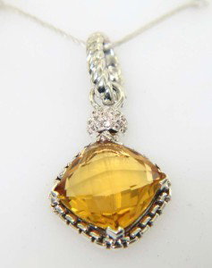 David Yurman Silver Citrine & Diamond Pendant: David Yurman Silver Citrine & Diamond Pendant. The total Pendant's weight is 3 grams. The total weight of diamonds is 0.1 cts. approximately I and SI clarity. The size of citrine is 10 x 10 mm. The si