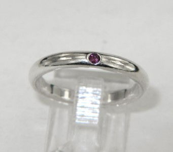 Tiffany & Co Elsa Peretti Silver Ruby Band: Tiffany & Co Elsa Peretti Silver Ruby Band. Ring weight: 2.6 grams. The total weight of ruby is 0.04 ct. approximately. The size of the ring is 5.5. The ring is 2.5 mm wide and 2 mm in thickness.